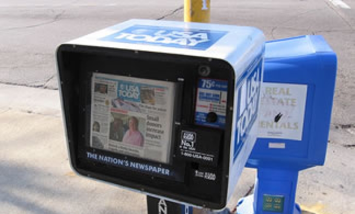 Gannett asks its employees to take a week off without pay, freezes wages for one year