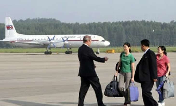 North Korea pardons two US journalists after Kim Jong-il's meeting with former President Bill Clinton