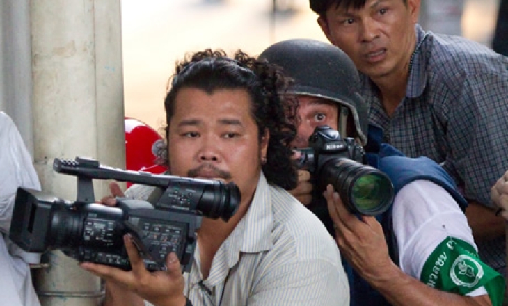 Journalists playing with death while shooting political unrest in Thailand