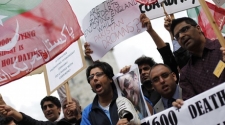Channels blocked, papers burnt over coverage of shoes thrown at Zardari