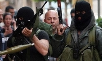 Hezbollah forces shut down pro-govt TV in Lebanon, newspaper office set ablaze