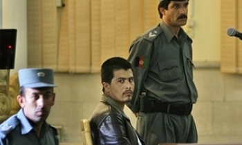 Afghan reporter denies blasphemy, begins death trial without defence lawyer