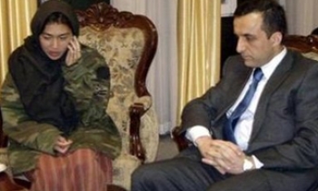 Freed Canadian reporter is back home but her Afghan assistants remain in detention