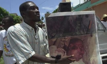 Seven years after Haitian radio journalist’s murder, seven convicted killers still at large