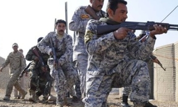 Policemen attack journalist's home in Baghdad, injure wife and relatives