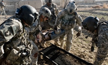 Photographer injured in Afghanistan after stepping on makeshift bomb