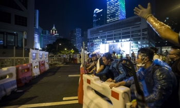 Hong Kong police use force to block reporting of pro-democracy rallies